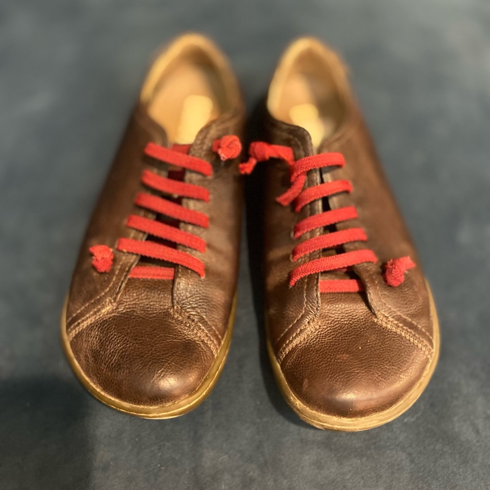 Camper shoes. Pretty clean. No stain, no tear. Super comfy as you know!